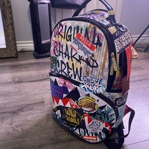 Sprayground Black and Red Urban Graffiti Backpack